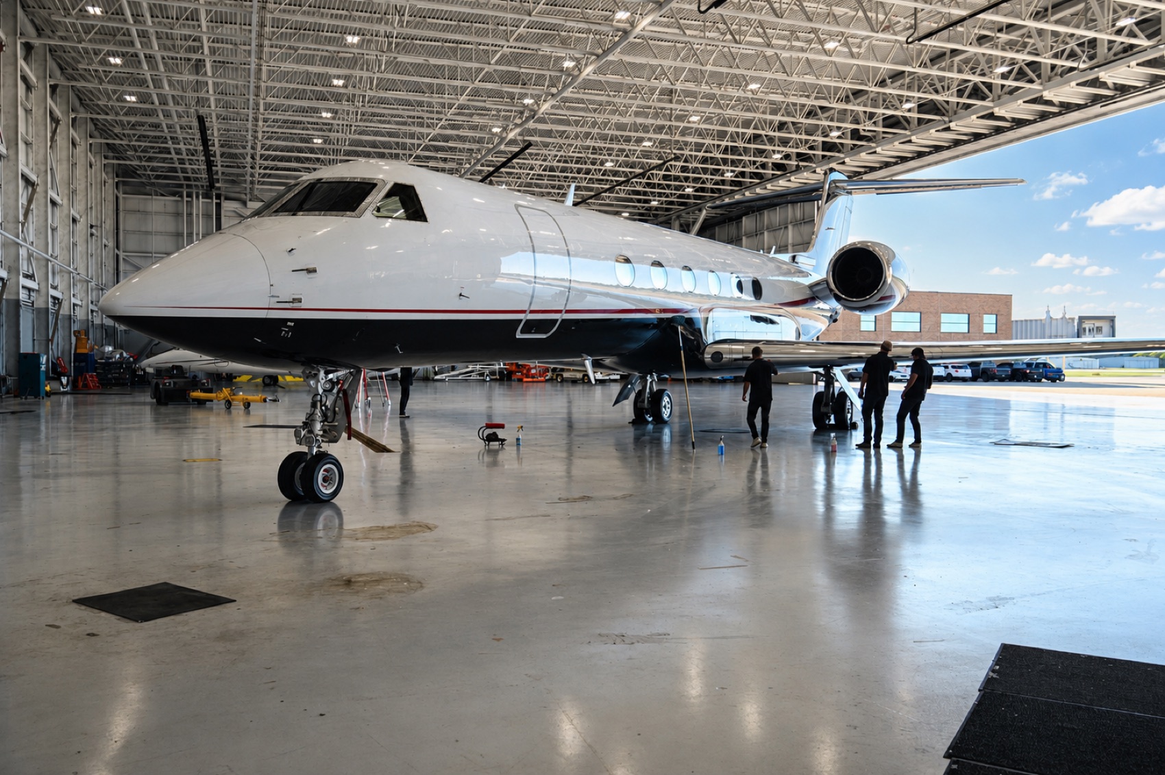 Gulfstream G5 aircraft detailing in progress in a Michigan hangar