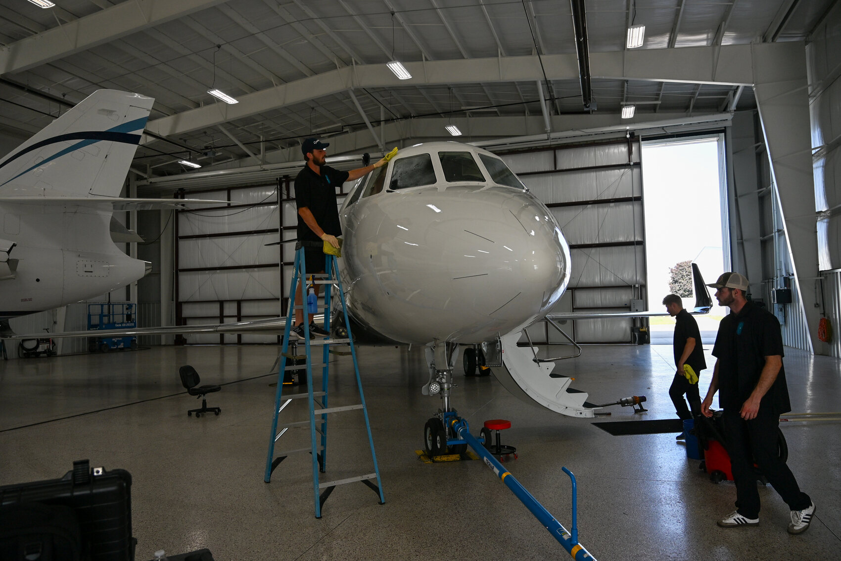 Tail and fuselage detailed, hangar door open